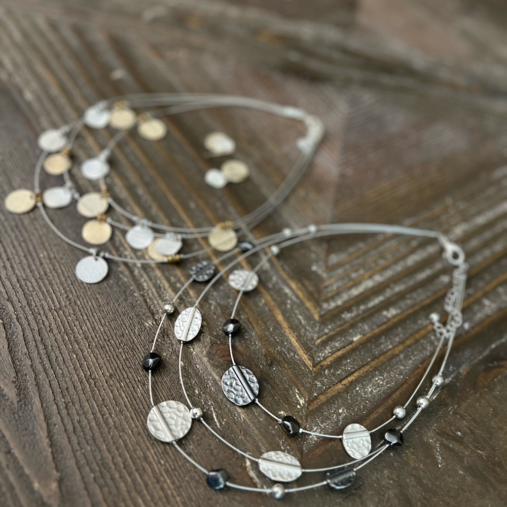 Two necklaces and one pair of earrings